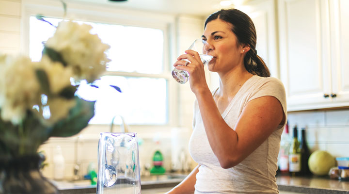 How much water should a person drink daily? The National Academies of Sciences, Engineering, and Medicine recommends approximately 91 ounces for women and 125 ounces for men, and this includes water from foods and beverages. Learn more: